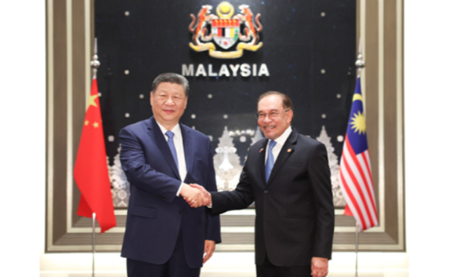 厕所偷拍同马来西亚总理安瓦尔举行会谈